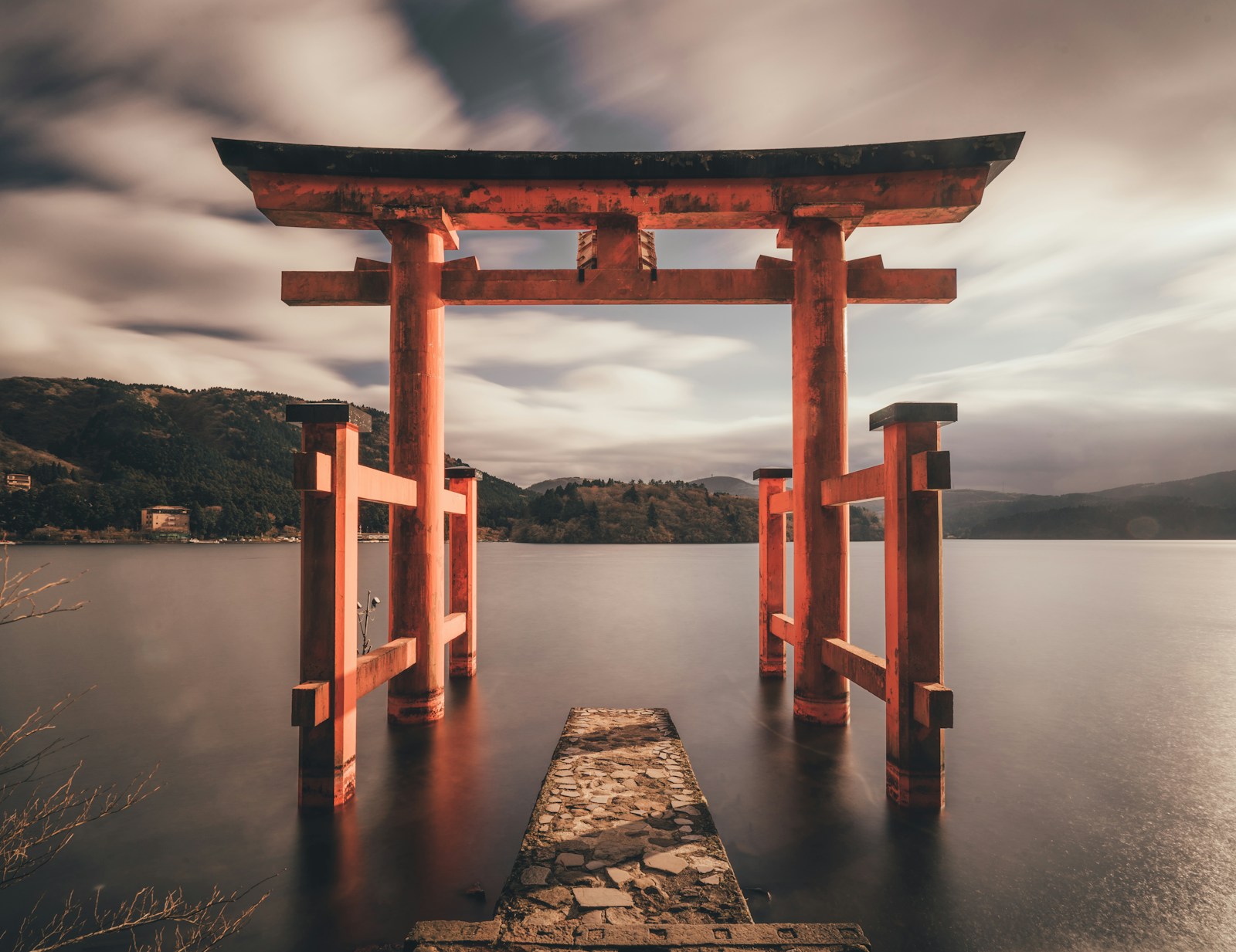 Torii gate standing in Lake Ashi, Japan